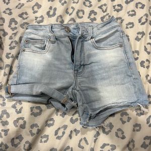 Blue jean shorts (can roll or unroll) size 00